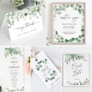 May include: A set of wedding stationery featuring a watercolor eucalyptus design. The set includes a thank you card, a welcome sign, a ceremony program, a favor tag, and a card and gift sign. The text on the cards reads "many thanks", "custom sign", "happily ever after", and "cards and gifts".