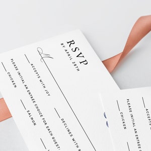 May include: RSVP card with a black and white design. The card has a section for guests to indicate their attendance and meal choice. The text reads "RSVP by April 28th" and "Please initial an entree choice for each guest: Chicken, Salmon, Declines with regrets."