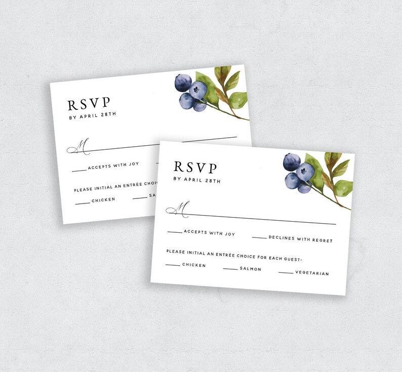May include: RSVP card with a watercolor illustration of blueberries and leaves. The card has a section for guests to indicate their attendance and meal choice. The options are "Accepts with Joy", "Declines with Regret", "Chicken", "Salmon", and "Vegetarian".