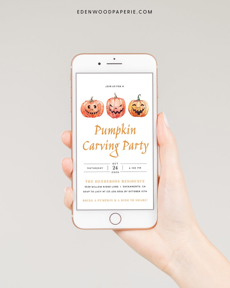 May include: A smartphone displays a Halloween-themed invitation. The invitation features three watercolor pumpkins with carved faces above the words "Pumpkin Carving Party." Details include the date, time, and location. The website address "EDENWOODPAPERIE.COM" is at the top.