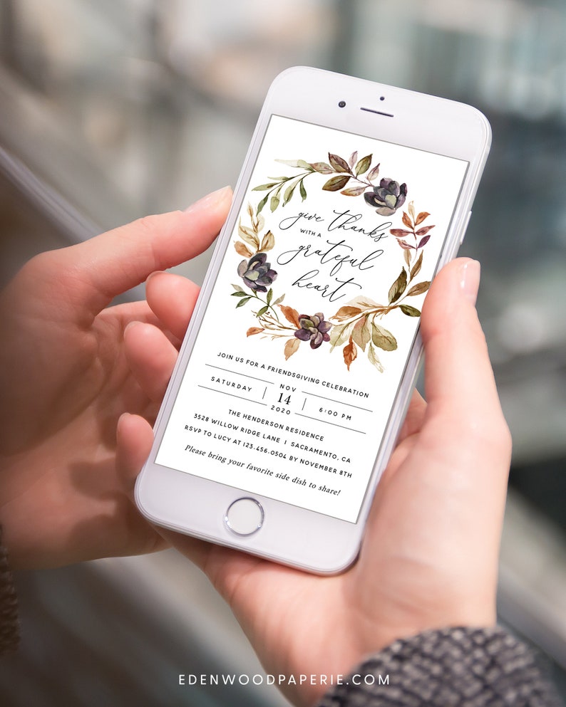May include: A digital invitation for a Friendsgiving celebration with a watercolor wreath of autumn leaves and berries. The text reads "Give thanks with a grateful heart." The invitation includes the date, time, location, and RSVP information.