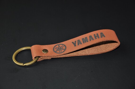 lv pom pom keychain