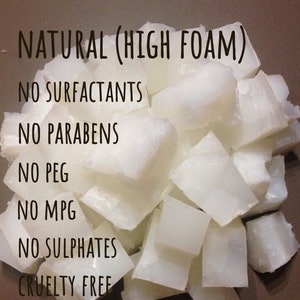 May include: A pile of white soap bars. The text on the image reads "NATURAL (HIGH FOAM)" "NO SURFACTANTS" "NO PARABENS" "NO PEG" "NO MPG" "NO SULPHATES" "CRUELTY FREE" "VEGAN"