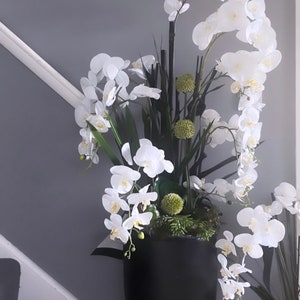 Floor standing tall faux artificial orchid grass succulent moss allium plant artificial orchid leaf arrangement in matt black pot vase bowl