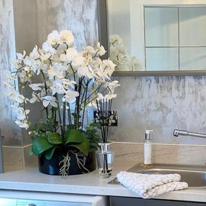 Artificial White Orchid arrangement in black gloss vase. Handmade, unique, stylish flower arrangement.  Vase ALWAYS included. Top Seller.