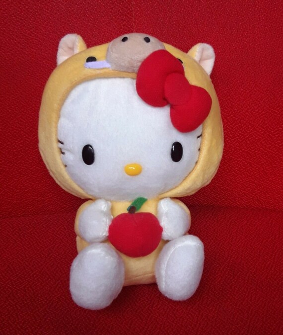 Hello Kitty Holding Apple