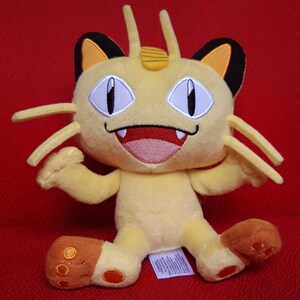 Meowth peluche clearance