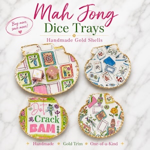 May include: Four shell-shaped trays with gold-painted edges, featuring colorful illustrations of Mah Jong tiles and floral motifs. The trays display various patterns including text that reads Dot, Crack, and Bam. Two small dice rest on one tray.