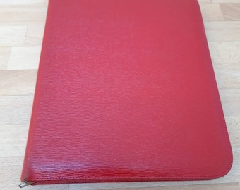 A stunning red leather writing case