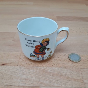 Vintage Empireware nursery rhyme tea cup and saucer