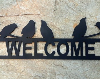 Welcome to Birds on a wire. This plaque is 18" x 7" with 3" letters, made of 14ga. steel MADE in Pioneer, Ca USA