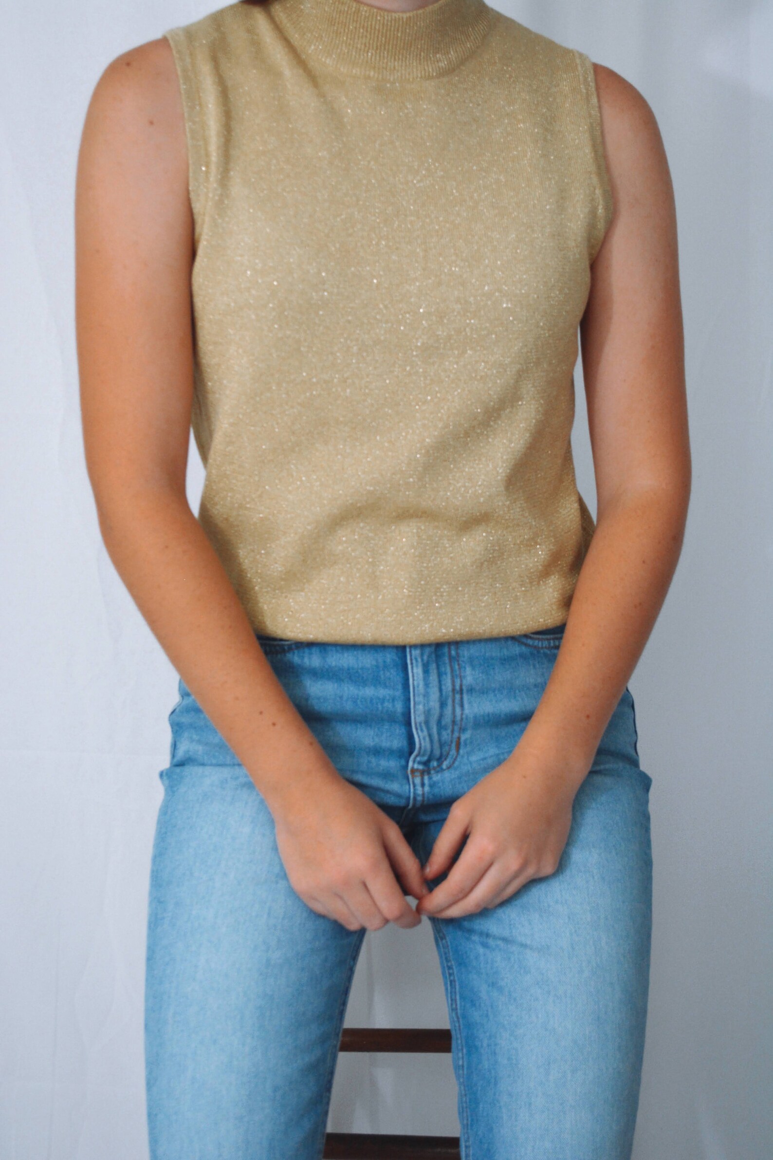 gold turtleneck outfit