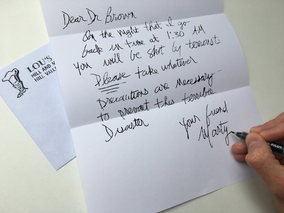 LOU'S CAFEで書かれたマーティ・マック・フライからドク・ブラウンへの