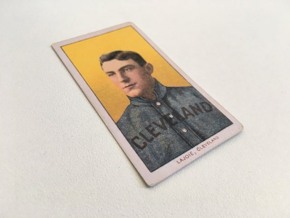 baseball cigarette cards Controversial $1 Million Ty Cobb Card Found In Old Paper Bag Sparks Big Debate have for collectors Napoleon Lajoie T206 Baseball Card