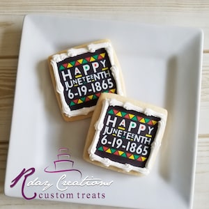 May include: Two square sugar cookies decorated with white icing and a black and white image of the words "Happy Juneteenth 6-19-1865" with a colorful pattern of red, yellow, and green triangles.