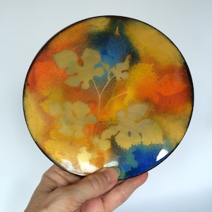 Enamel Art Plate with Leaves on a Colorful Background