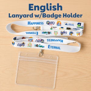 May include: Two white lanyards featuring blue text reading Happiness and Eternal, interspersed with various colorful city logos and the year 2026. Each lanyard includes a metal swivel hook attached to a clear, rectangular plastic badge holder.