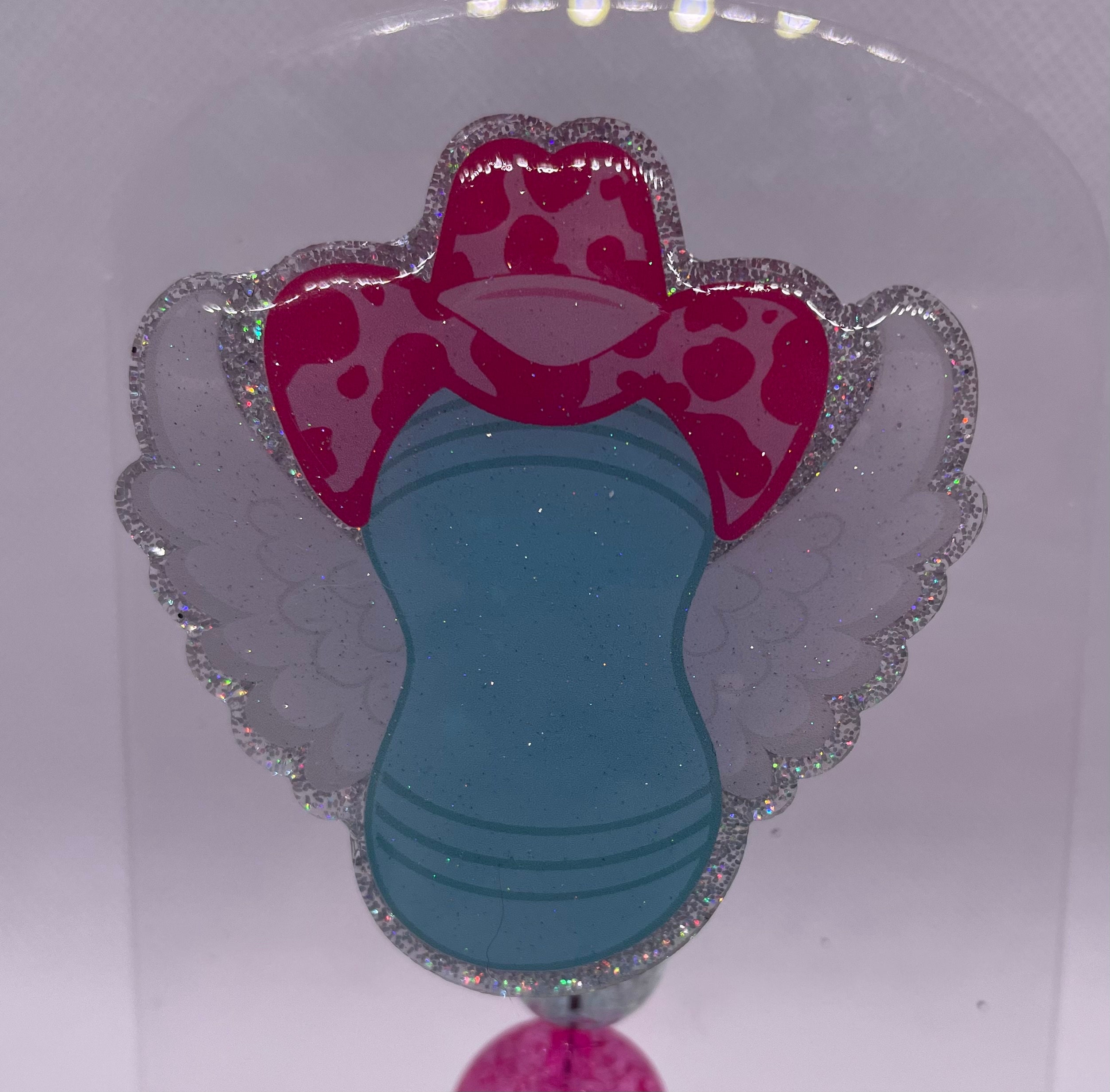 Flying Cowgirl Peanut Ball Badge Reel