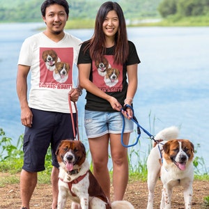 A couple wearing a custom pet t-shirt 
theman is wearing a white custing pet t-shirt and the woman is wearing a black custom pet t-shirt 
The couples are holding TWO AKITA bernard breed dogs
Couples wearing bernard custom pet t-shirt