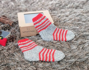 Knitted grey socks with red stripes for 2-3 age