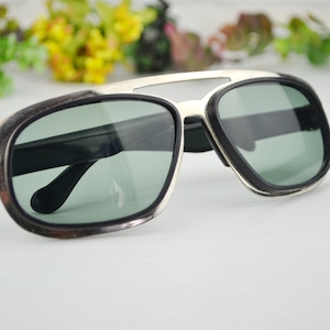 Vintage stylish  sunglasses . Vintage Eyes Sunglasses . Retro sunglasses . Retro eyewear . USSR glasses. Fasion 1980s