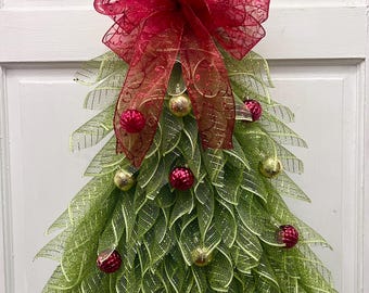 Christmas Custom Tree Wreath can hang anywhere. Christmas Tree Wreath is a hanger for anywhere in your home.