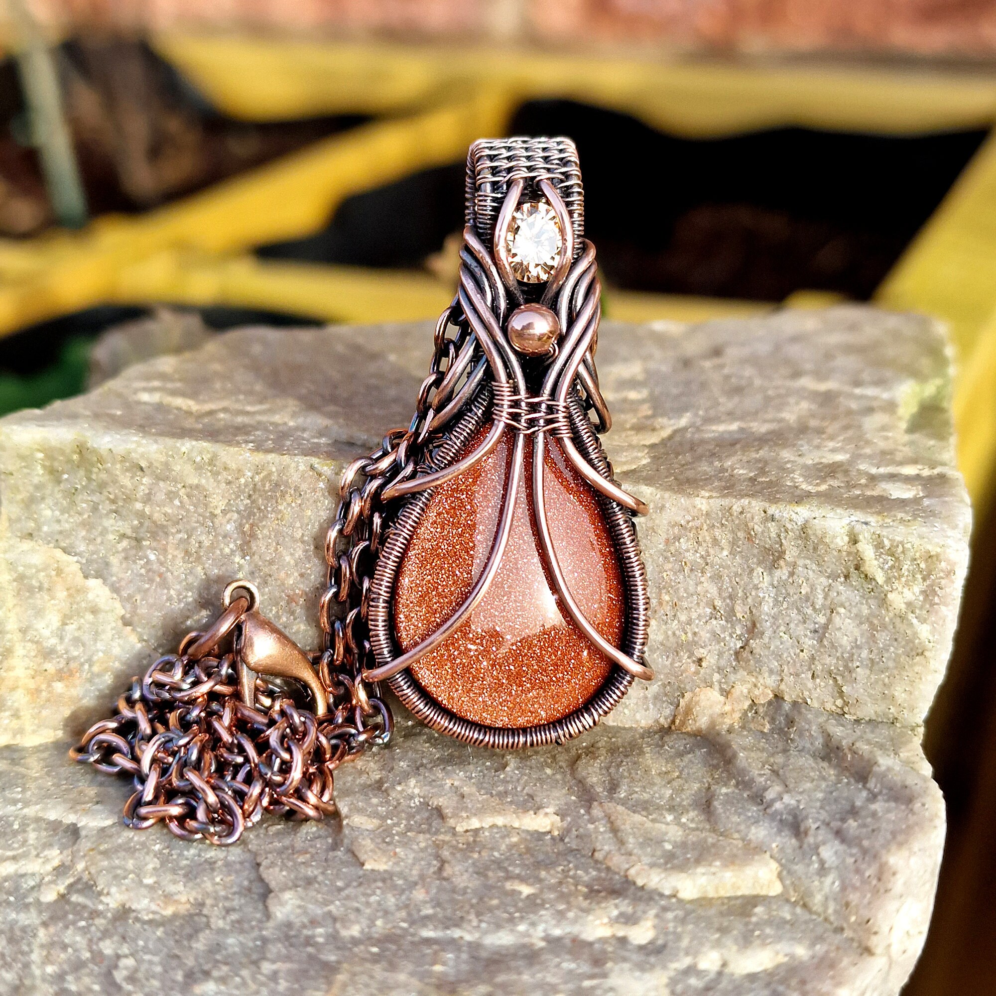 Antiqued Copper Goldstone & Cubic Zirconia Pendant Wire