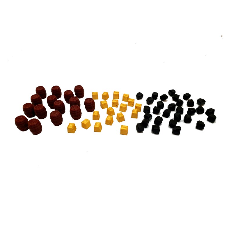 May include: A collection of small wooden barrels, gold cubes, and black cubes. The barrels are brown with a red band around the middle. The cubes are all the same size and are arranged in three rows.