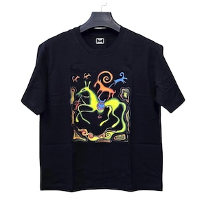 May include: Black t-shirt featuring a colorful, abstract design of a horse and other figures. The artwork is outlined in yellow and green, with accents of orange, blue, and red. The shirt has a crew neck and short sleeves.