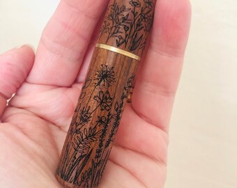 Hardwood, laser etched needle keeper