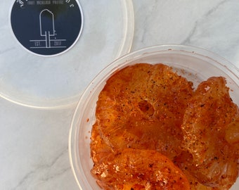 Gourmet Sweet Dried Pineapple coated in Homemade chamoy and spice seasoning