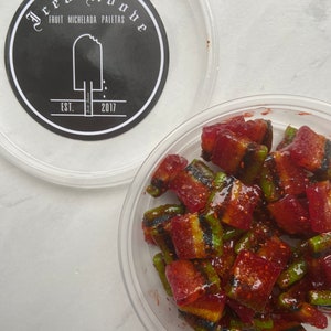 Sweet and Sour airhead extreme candy coated in homemade sweet and spicy chamoy