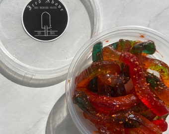 Gourmet Sweet and Spicy Gummy Worms coated in a tasty homemade chamoy and spice mix