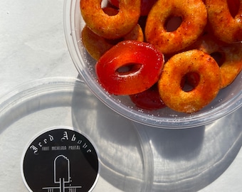 Gourmet Gummy Rings coated in Homemade chamoy and spice seasoning