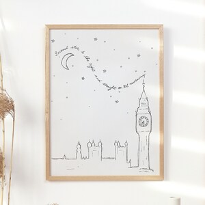 May include: A framed print with a black and white illustration of Big Ben and the London skyline. The print has the text "Second star to the right and straight on til morning."