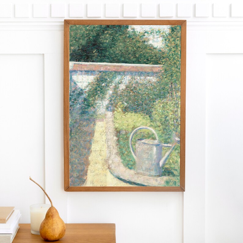 May include: A framed painting of a garden scene with a watering can in the foreground. The painting is in a wooden frame and depicts a path leading through a lush green garden.