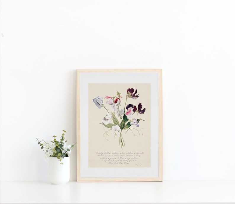 May include: A framed botanical print featuring a bouquet of sweet pea flowers in shades of purple, pink, and white. The artwork is set against a cream-colored background and includes handwritten text. The frame is a light wood color.