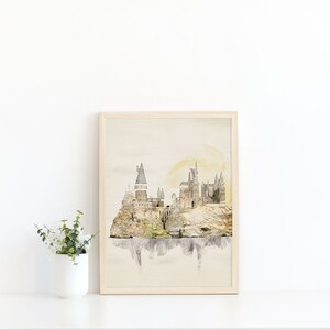 Close of up of the watercolor castle printable. It has subtle tans and grays, with a pale yellow moon rising behind it.