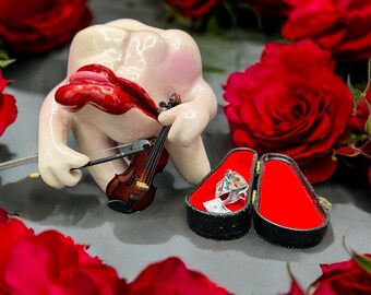 Arte dental original hecho a mano con violín.