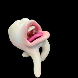 handgemaakte popart-sculptuur met grappige tanden voor tandartspraktijken en verzamelaars
