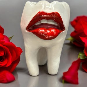 handmade teeth figurine playful decorative art