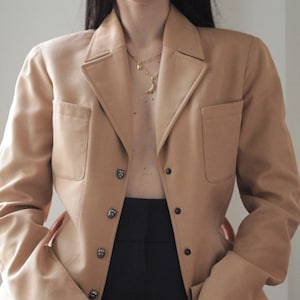 Vintage 90s Thierry Mugler blazer with dog head buttons
