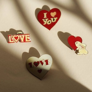 Vintage 70s set of four enameled metal love pins