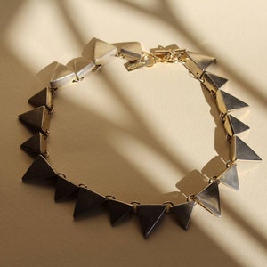 Vintage 90s Moschino goldtone necklace