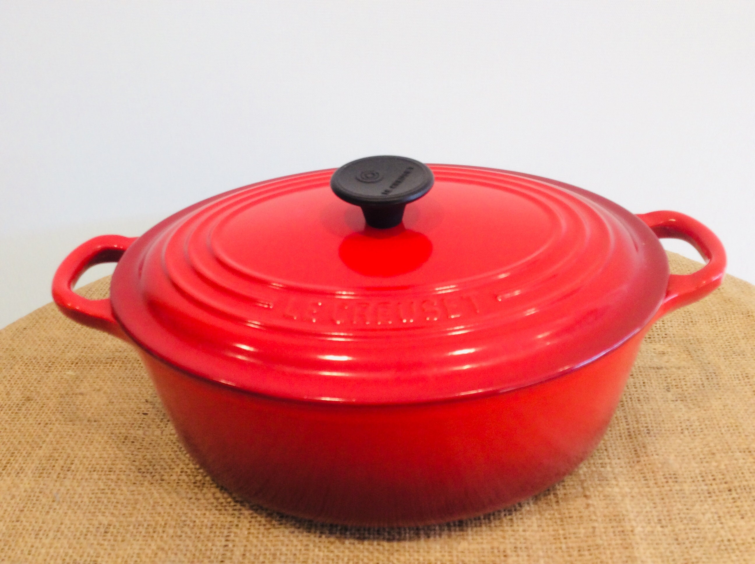 Cerise Red 6.75 quart Oval Dutch Oven Signature