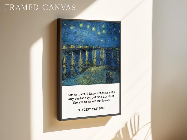 The image is a framed canvas depicting a night sky with stars, and it is hanging on a wall.