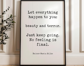 May include: A rectangular framed wall art piece featuring black typewriter-style text on a white background. The quote reads: Let everything happen to you: beauty and terror. Just keep going. No feeling is final. The author is Rainer Maria Rilke.