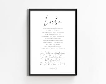May include: Black and white printable wall art with a quote about love in German. The quote reads: "Liebe ist langmütig und freundlich, die Liebe eifert nicht. Die Liebe treibt nicht Mutwillen, sie blant sich nicht auf. Sie verhalt sich nicht ungehörig, sie sucht nicht das ihre. Sie lässt sich nicht erbittern, sie rechnet das böse nicht zu. Sie freut sich nicht über die Ungerechtigkeit, sie freut sich aber an der Wahrheit. Die Liebe se erträgt alles, glaubt alles, hofft alles, hält allem stand. Die Liebe hört niemals auf."  The quote is attributed to "1. Korinther 13."