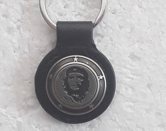 porta-chaves, couro, preto, che guevara, porta-chaves redondo, 3,5 cm de diâmetro, che guevara em liga de zinco
