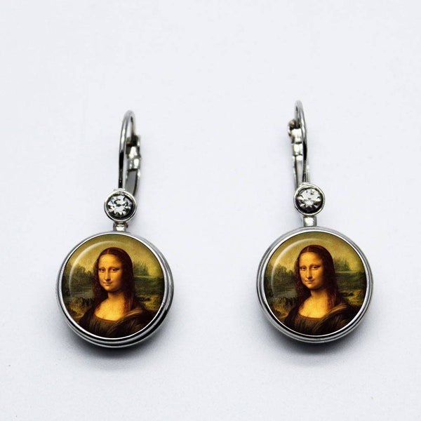 Boucles d oreilles faux strasses mona lisa.la joconde.boutons pressions